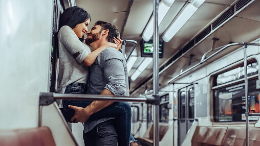 Young romantic couple in subway. Underground love story.